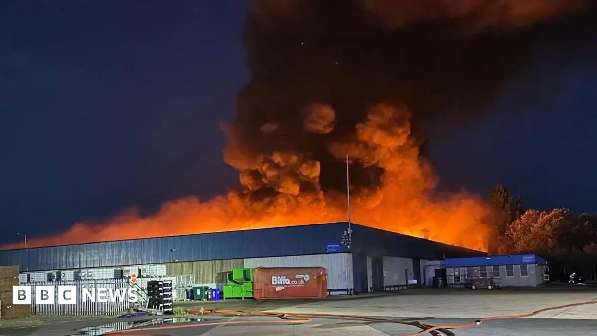 Fire Crews Respond to Warehouse Fire in Derby, Smoke Spreads Across County