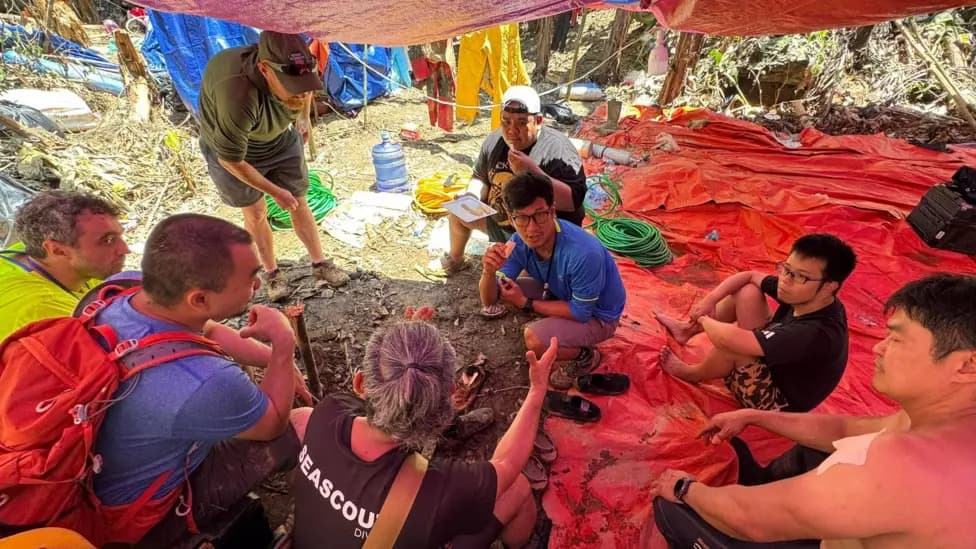 Laos Flooded Cave: Rescued Gold Prospectors Aid Search for Two Missing Men
