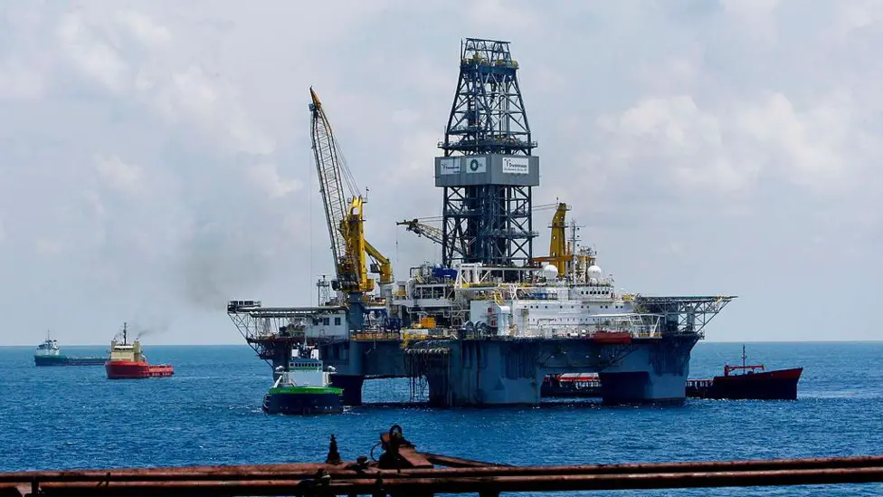 Energy Giants, Banks, and Arms Manufacturers Accumulate Billions From Iran Conflict